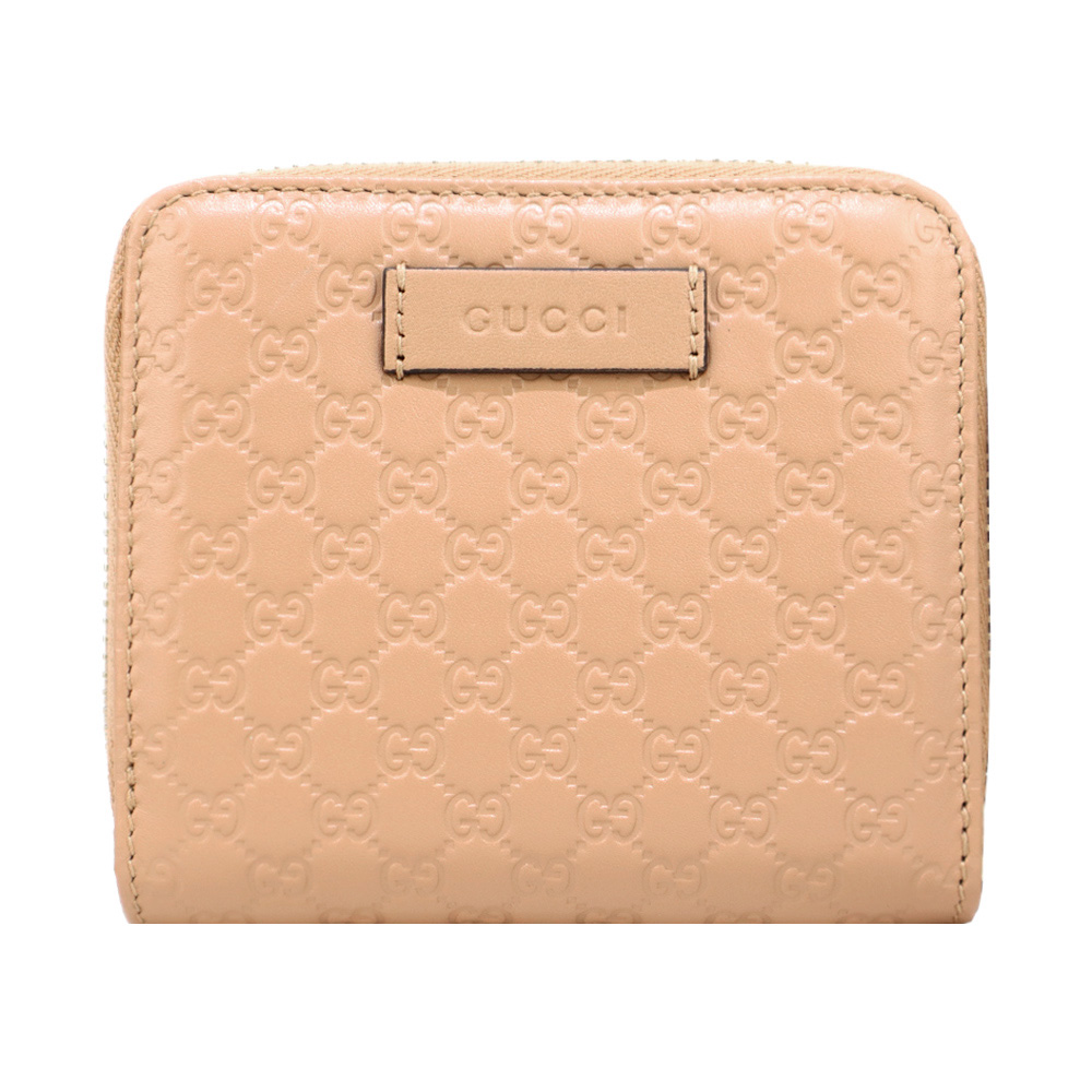 GUCCI 經典Guccissima GG壓紋牛皮拉鍊短夾(粉膚) /平行輸入